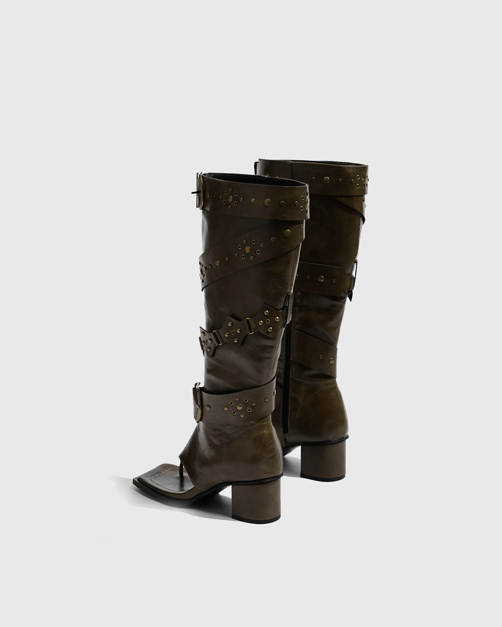 Crocetta Thong Buckle Knee High Boots In Brown
